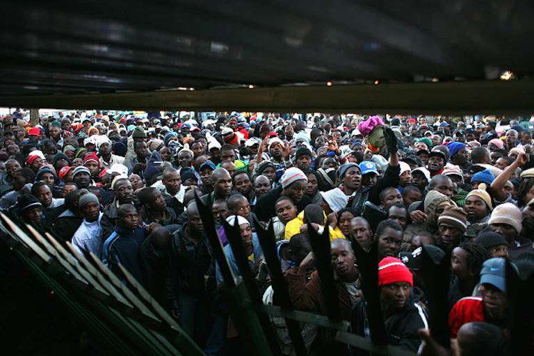 Hundreds of people in a queue.