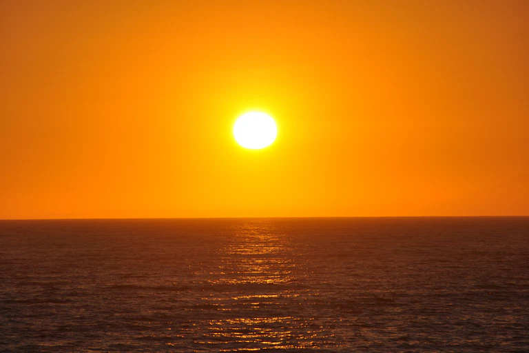 hot sun over ocean