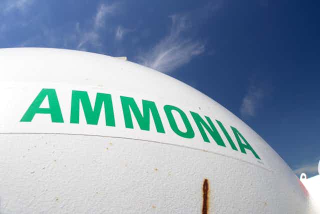 A storage tank with the word 'ammonia' in green