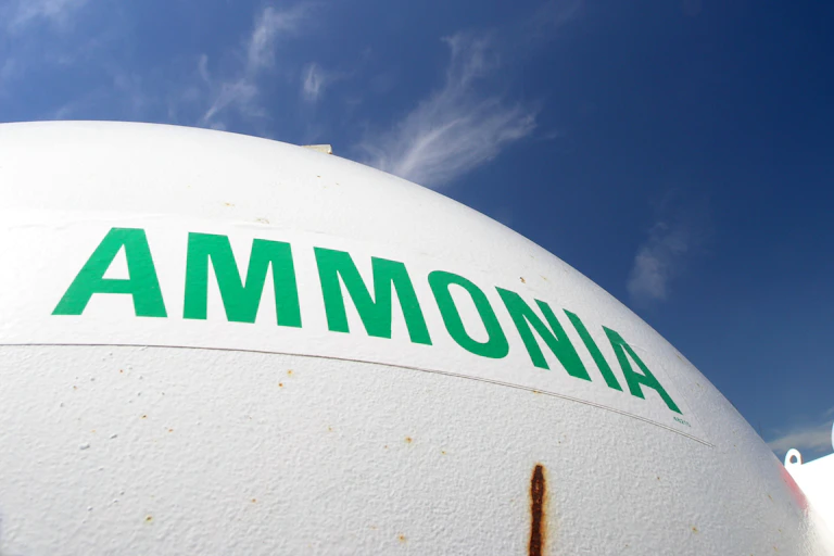 A storage tank with the word 'ammonia' in green