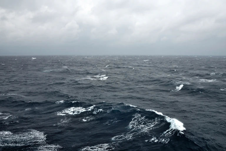 rough sea, moody sky