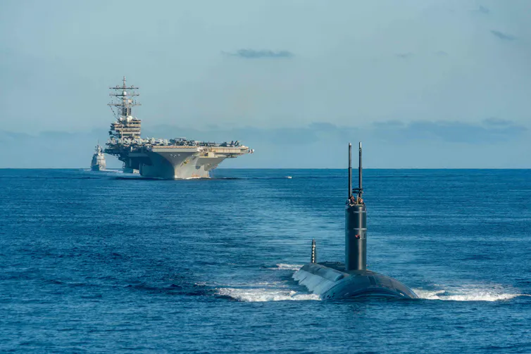 A US naval battle group including an aircraft carrier, submarine and other ships in the Pacific near Korea