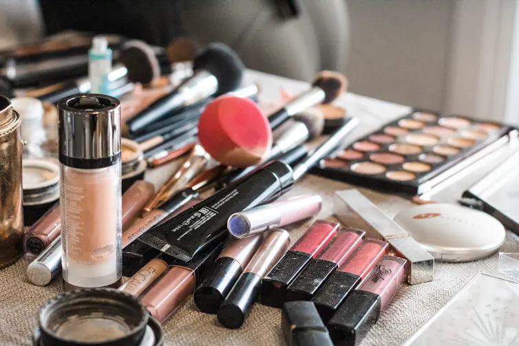 a table covered in makeup