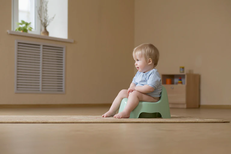 child on a potty