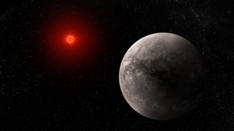 A planet near a dim red star.