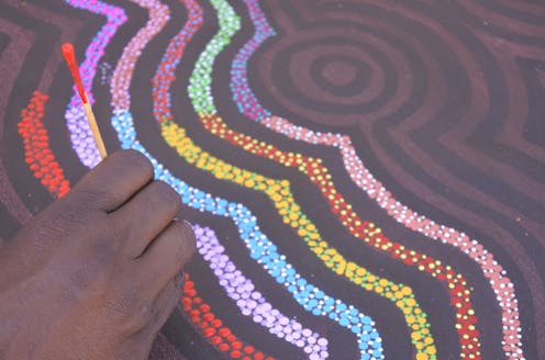 What do white staff do in remote Indigenous art centres?