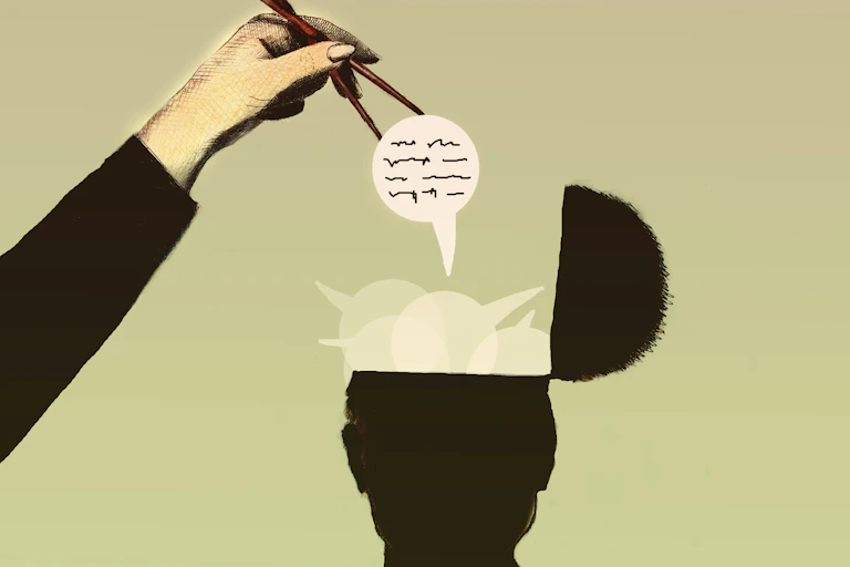 Hand uses chopsticks to extract thought bubble from man's head.