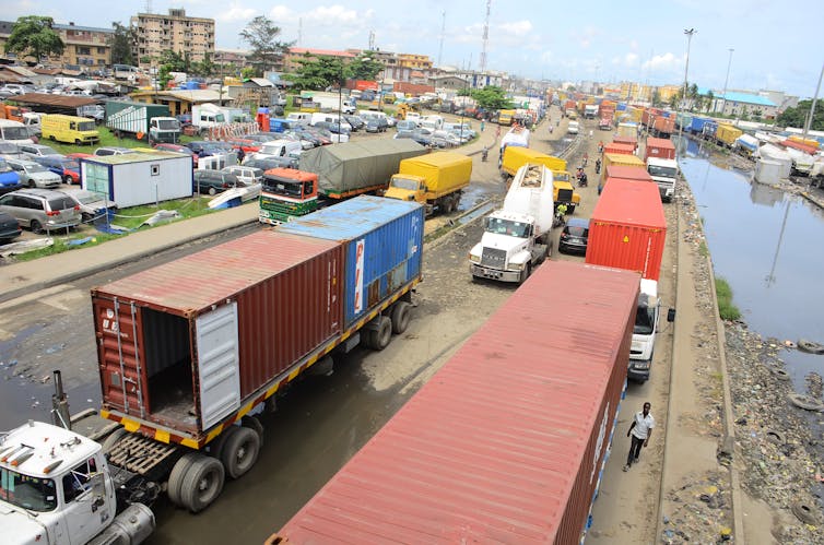 Trucks in a traffic jam on a busy highway