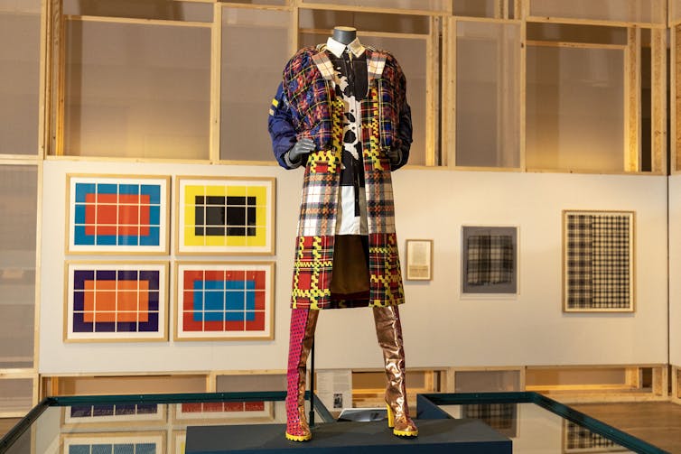 A suit made of various different tartan grids and colours