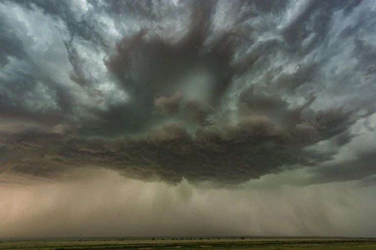 A dark cloud with rain.