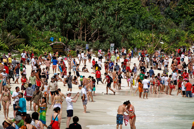 Crowds of tourists at Maya Bay, Thailand.