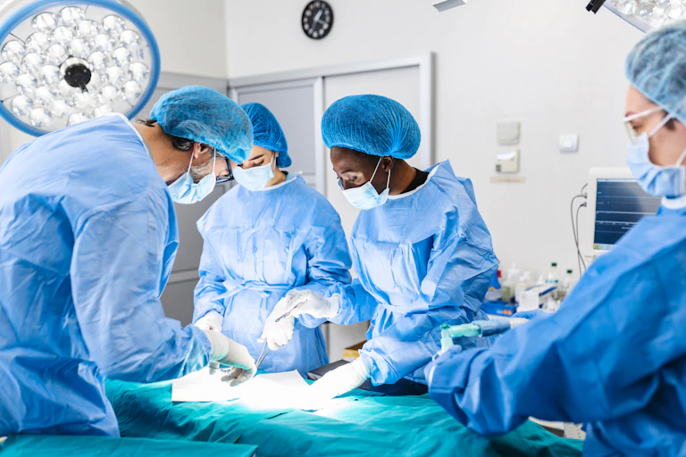 NHS surgical staff in a surgery setting.