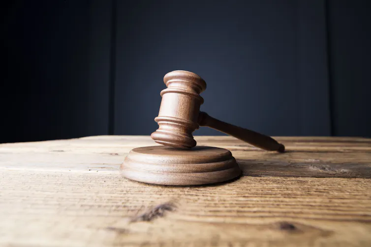 A judge's gavel and sounding block.