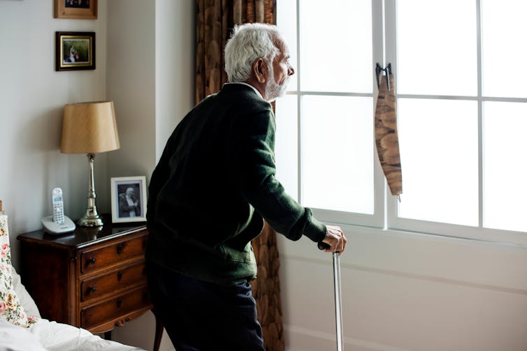 Older man in his bedroom