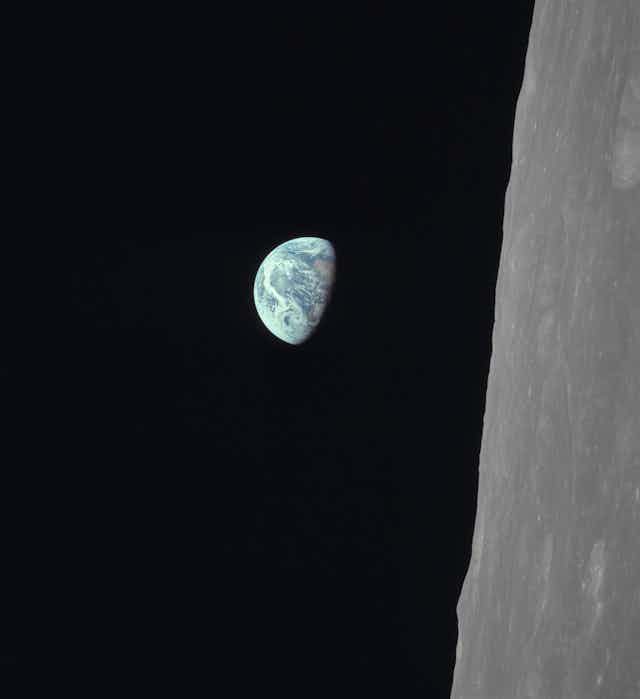 Earth seen from orbit around the Moon.