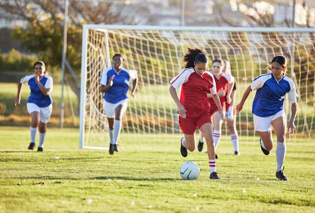 Women playing soccer