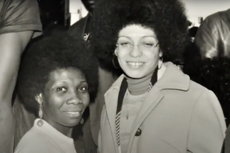 A black and white photo of Jessica Huntley and Angela Davies.