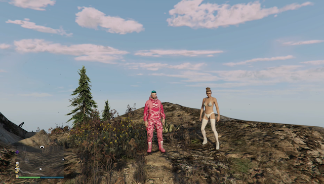 A man and a woman on a mountain landscape. He wears all pink, she is in white lingerie and thigh high boots. 