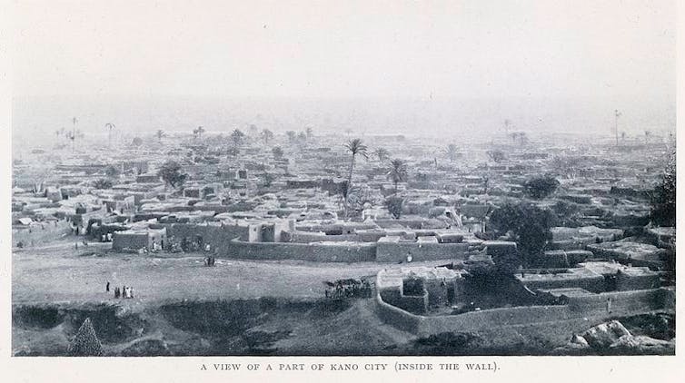 An archival photograph of an ancient city.