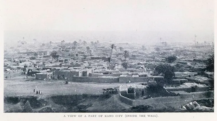 An archival photograph of an ancient city.