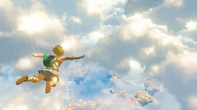 A video game character launches himself from the sky down to the world below. 