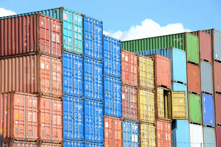 A stack of cargo shipping containerss.
