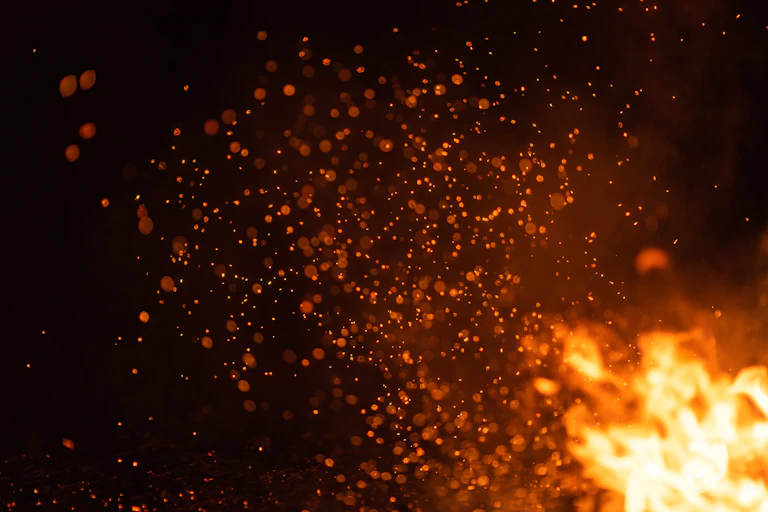 Sparks from a campfire.