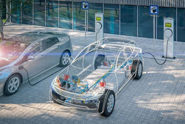 Illustration of electric car made transparent to show battery as it charges 