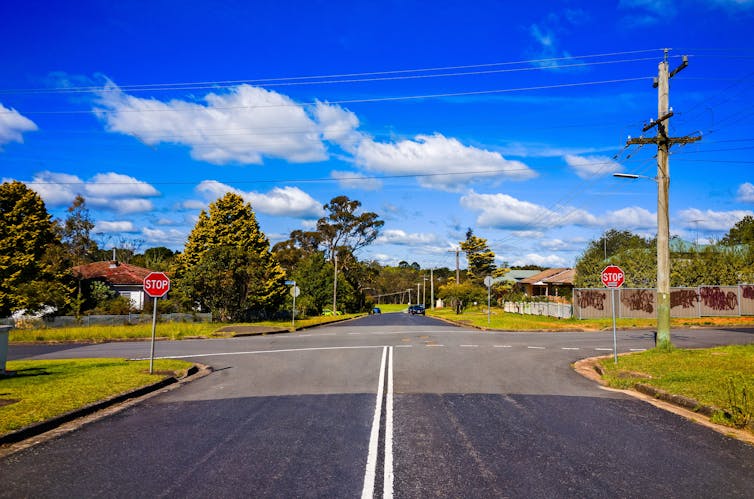 Approach to a stop sign in a suburban street