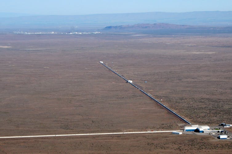 An L-shaped facility with two long arms extending out from a central building.