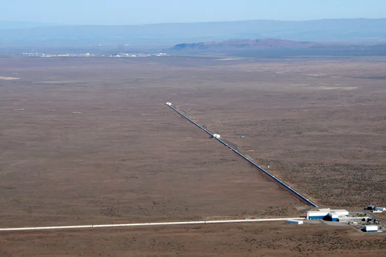 An L-shaped facility with two long arms extending out from a central building.