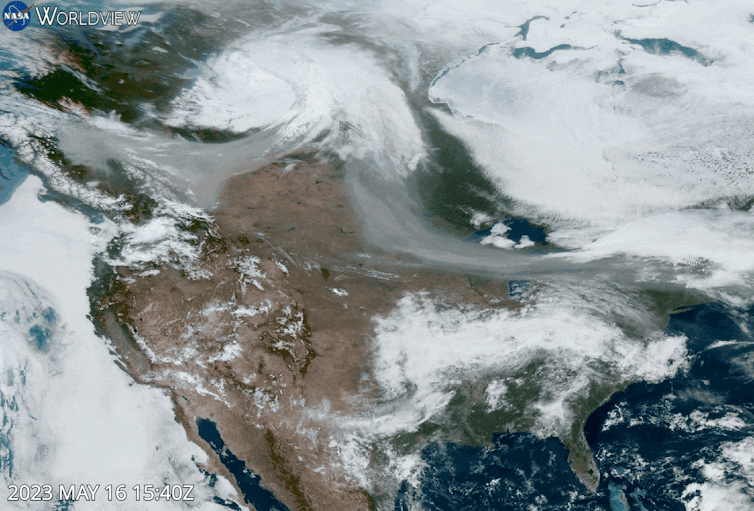 A satellite animation shows smoke moving from fires in Alberta across Canada and into New England