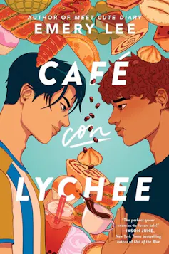 Two boys making eye contact in front of sugary snacks and drinks.