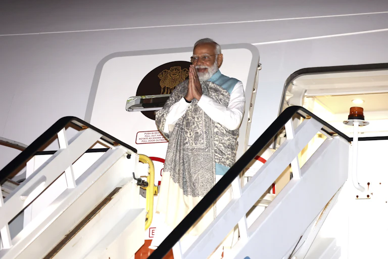 Indian Prime Minister Narendra Modi exiting a plane