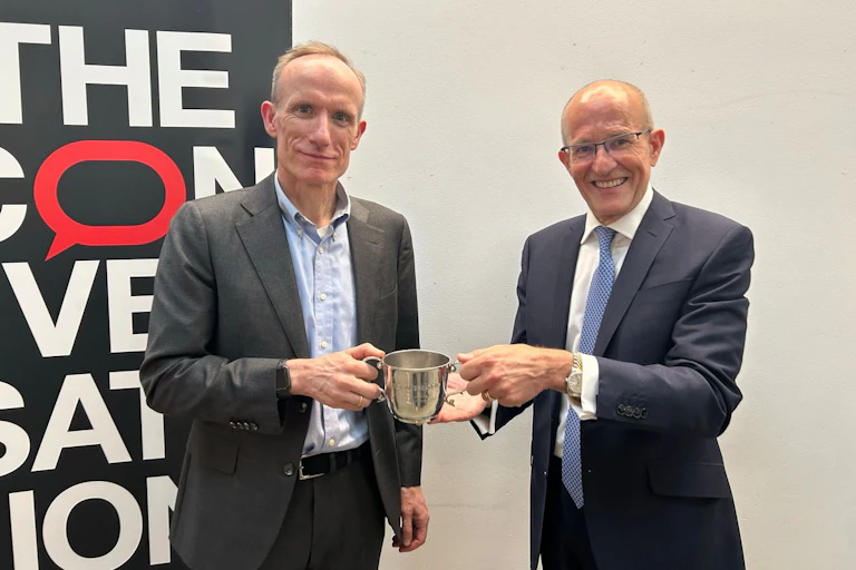 Stefan Wolff of the University of Birmingham and Sir Paul Curran holding the Sir Paul Curran award.