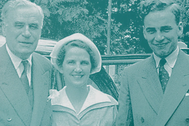 Black-and-white photo of parents and their son