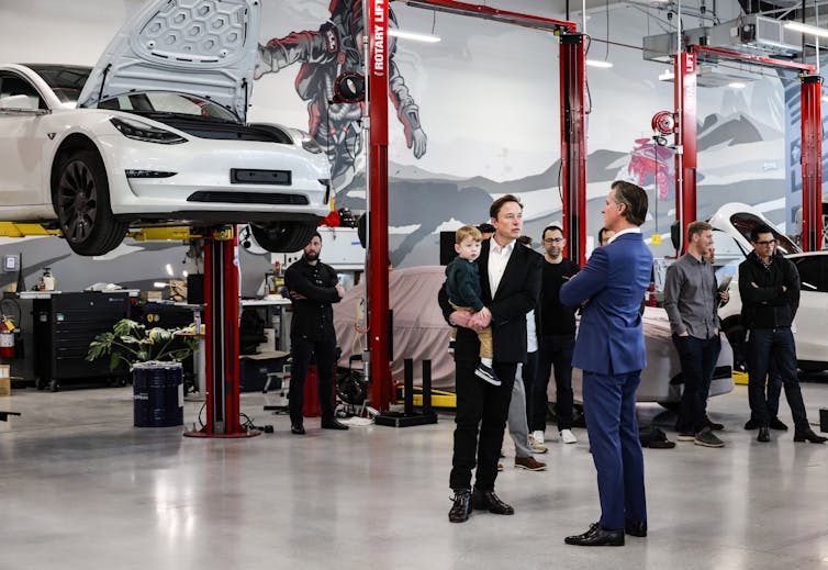 Elon Musk with California governor Gavin Newsom at Tesla's new global engineering and AI headquarters in Palo Alto, California in February 2023.