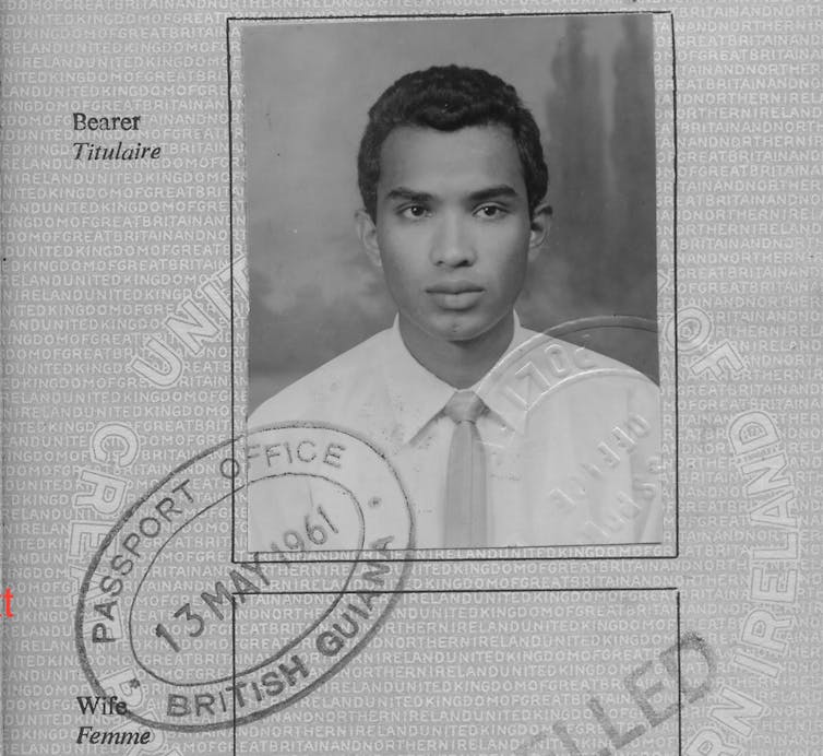 A passport photo of man from 1961.