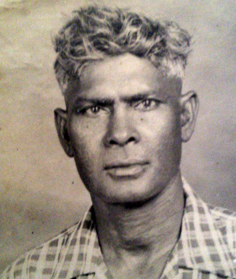 Black and white portrait photo of man.