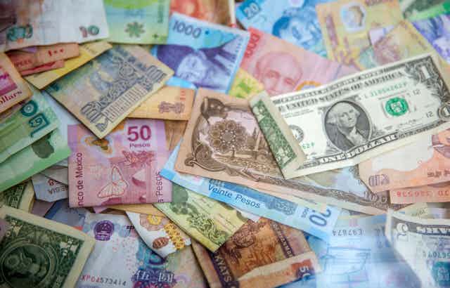 Colorful paper currencies from around many countries.