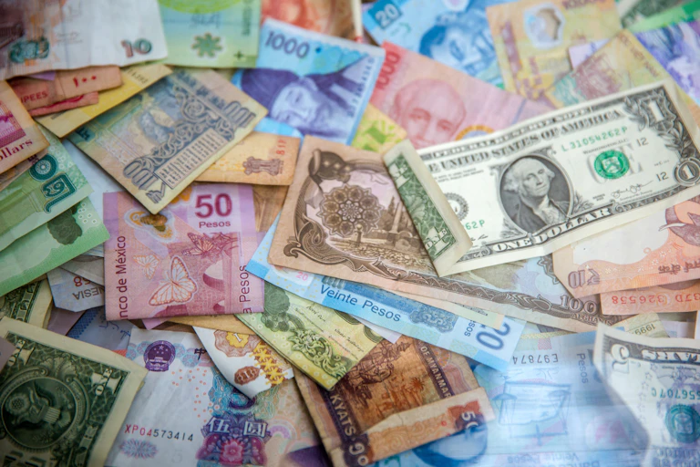 Colorful paper currencies from around many countries.