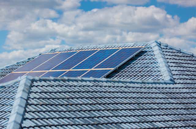 solar panels on blue roof