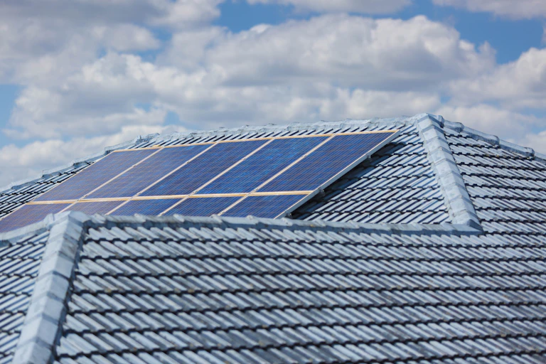solar panels on blue roof