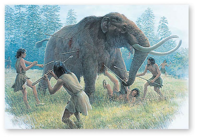artist's rendition of prehistoric people hitting a mastodon with spears