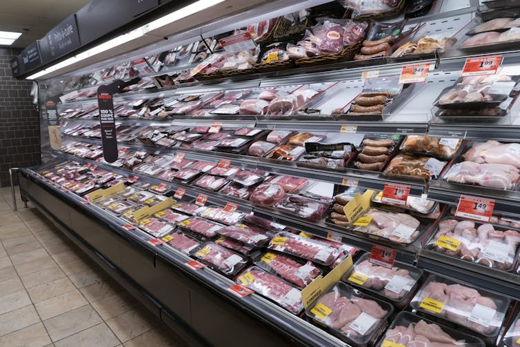 A meat counter in a grocery store