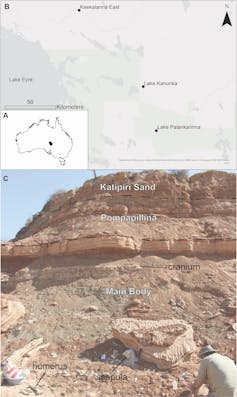 Photo of a rust coloured rock face and a map of Australia above it