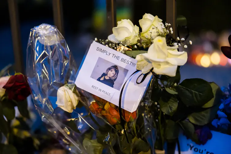 Flowers with a picture of Tina with the words