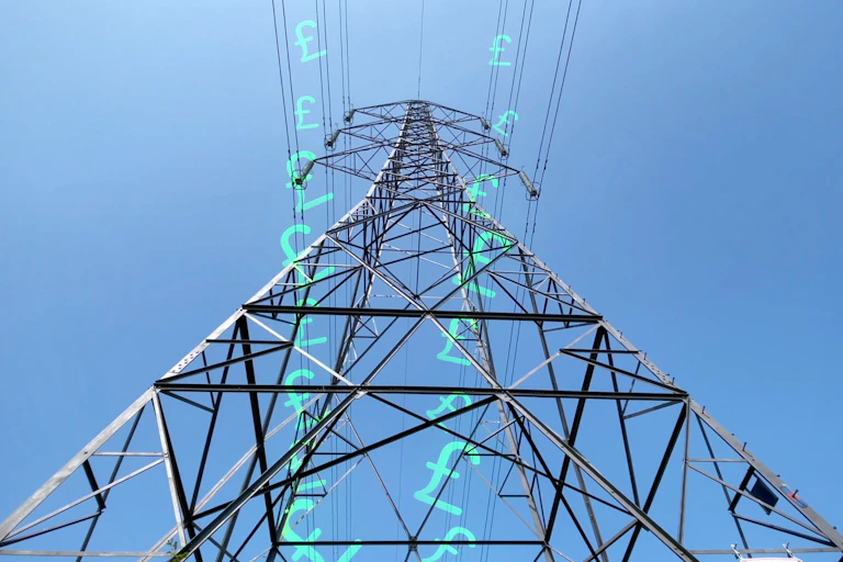 British £ pound symbol running down a electricity pylon.