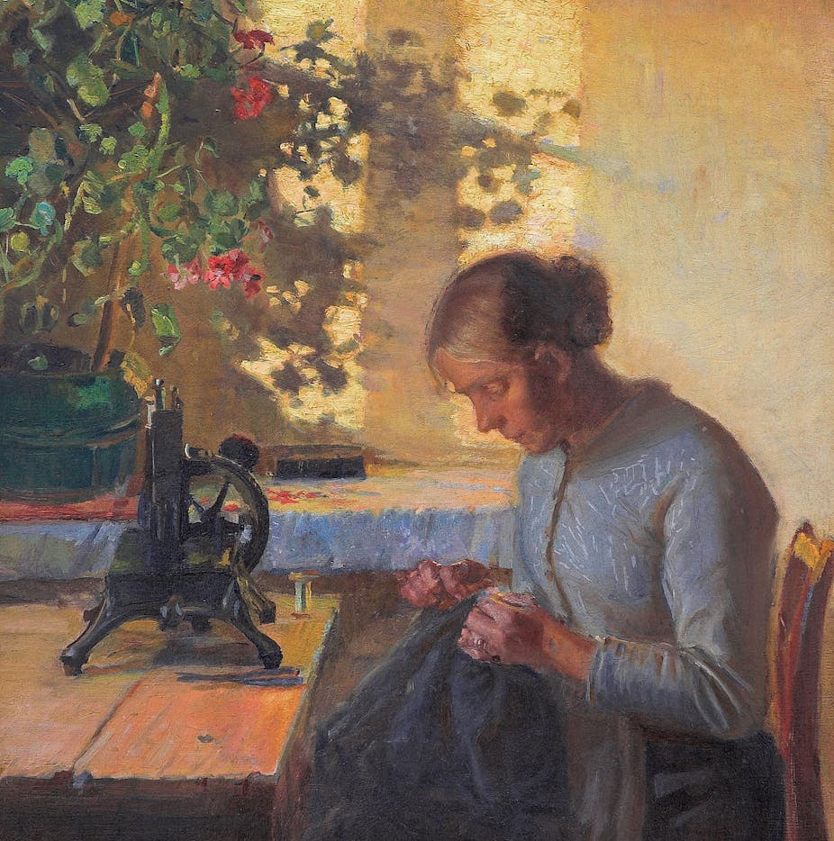 A painting of a woman with hair in a bun bent over a sewing machine. 