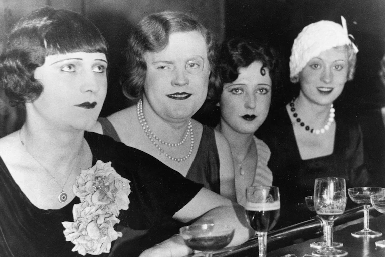 Black and white photo of four trans women.